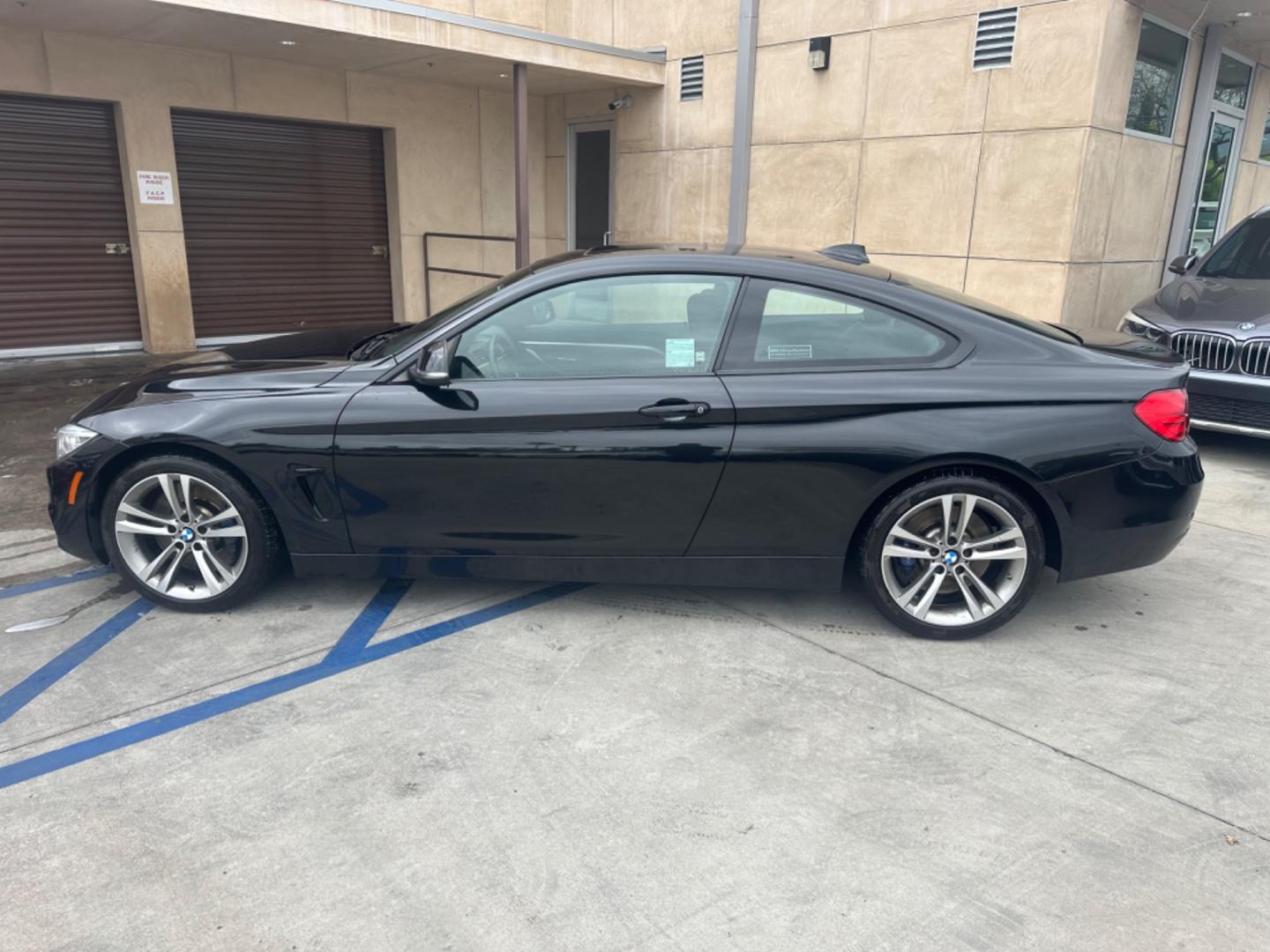 2015 Black BMW 4-Series 435i coupe (WBA3R1C55FK) with an 3.0L V6 DOHC 24V engine, 8-Speed Automatic transmission, located at 30 S. Berkeley Avenue, Pasadena, CA, 91107, (626) 248-7567, 34.145447, -118.109398 - Crown City Motors is a used “Buy Here Pay Here” car dealer in Pasadena CA. “Buy Here Pay Here” financing, means that when you purchase your vehicle from our dealership, that you make the payments to the dealership as well. We do not need the banks approval to get you approved for a used auto - Photo#1